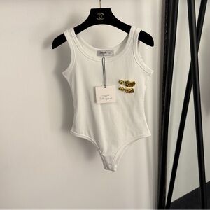 schiaparelli white sleeveless jumpsuit